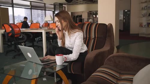 Multitask Businesswoman Works at the Office.