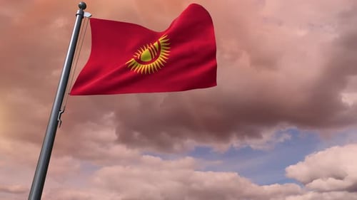 Kyrgyzstan Flag Waving Proudly Against a Cloudy Sky