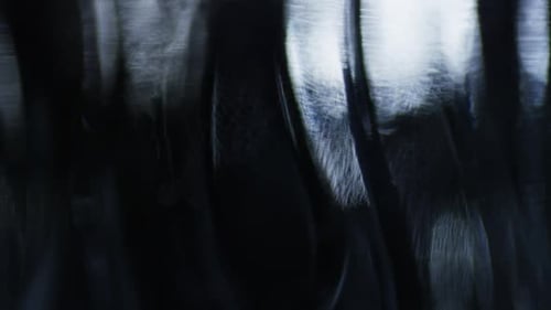 Abstract Dark Background with Streaks of White Light