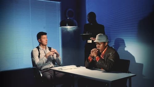 Police Interrogation of Suspect in Dark Room