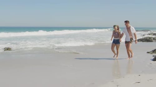 Young couple by the sea