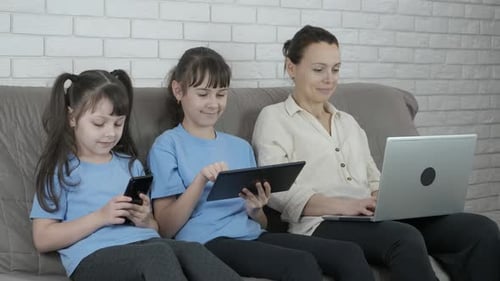 Family Relaxing at Home Using Technology