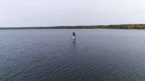 Aerial drone shot of alone windsurfer at big pond 04