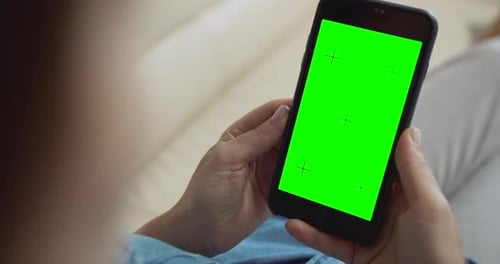 Cell Phone with Green Screen Held Vertically
