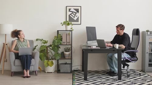 Team of Programmers Working in Office