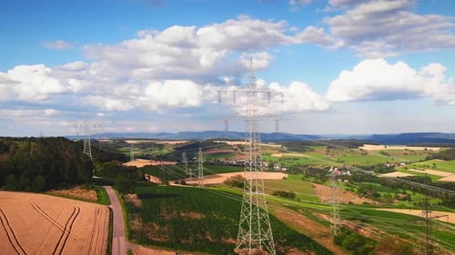 Aerial View of Rolling Hills with Power Lines