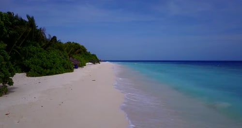 Wide angle aerial clean view of a summer white paradise sand beach and turquoise sea background in v