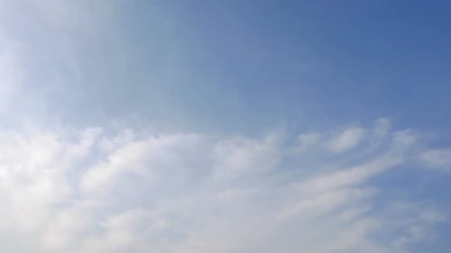 Time lapse of white cloud moving pass around sky background