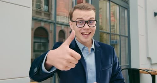 A Businessman is Holding a Video Meeting