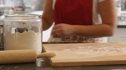 Preparing to roll dough for cookies