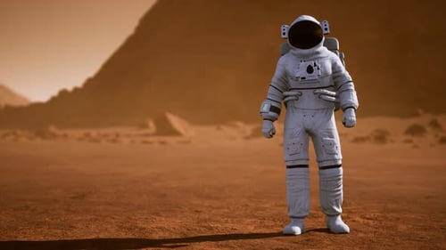 Astronaut on Mars Surface. Red Planet Covered in Gas and Rock