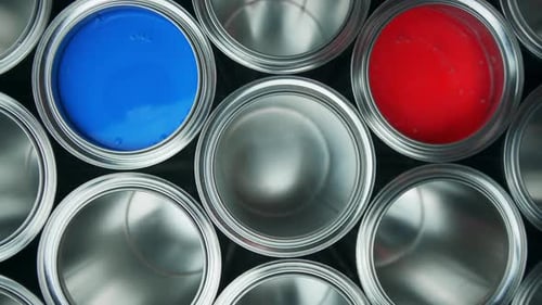 Macro Shot of Paint Cans with Blue and Red
