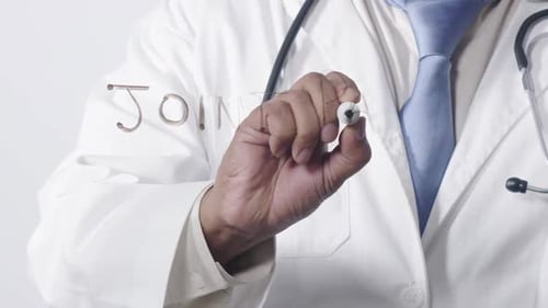 Asian Doctor Writing Joint Pain