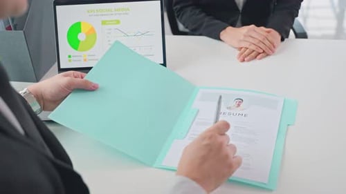 Close up of woman sit on table, give resume to hr manager for job interview in office workplace.