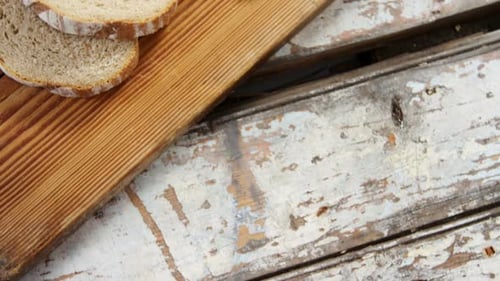 Sliced Bread Loaf on Rustic Wood