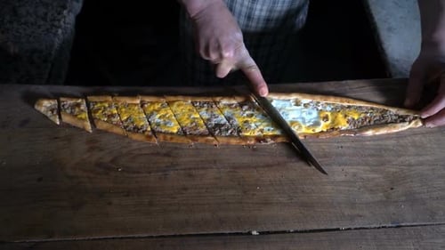 Cutting Turkish Food Pide