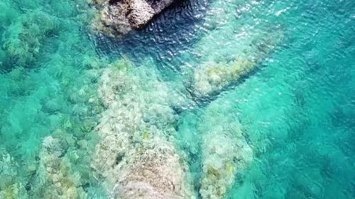 Aerial View of Turquoise wWaves Hitting Coral Reefs, Stones.
