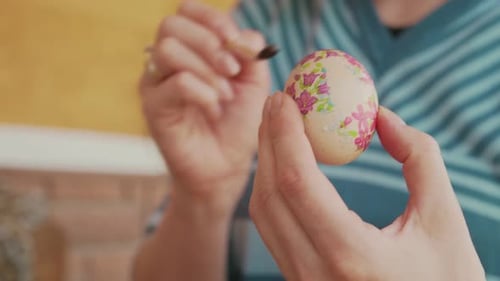 Woman Hands Decorating Easter Eggs