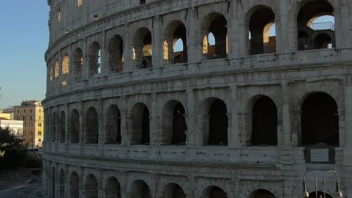 Roman Colosseum: Ancient Stone Arches in Bright Daylight