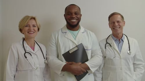 Portrait of Diverse Multiethnic Medical Colleagues Looking with Friendly Smiles at Hospital