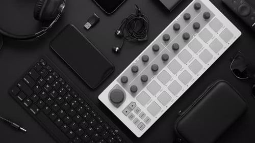 Tech and Music Equipment Flatlay Overhead