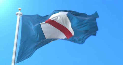 Newfoundland and Labrador Flag Waving Realistically in Blue Sky