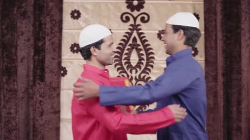 Muslim men giving gift on Eid