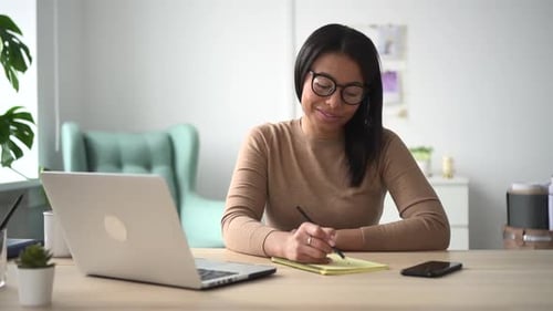 Confident Mixed Race Woman College Student in Glasses Studying with Laptop Spbd