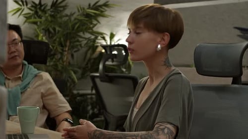 Two Partners Having Business Meeting in Office