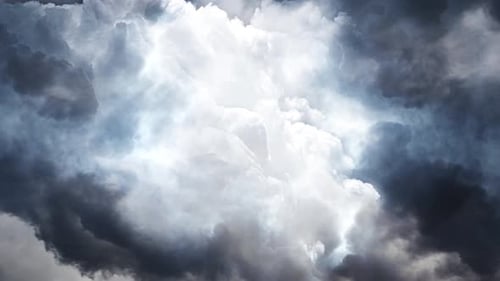 4k thunderstorm inside the clouds accompanied by a bolt of lightning