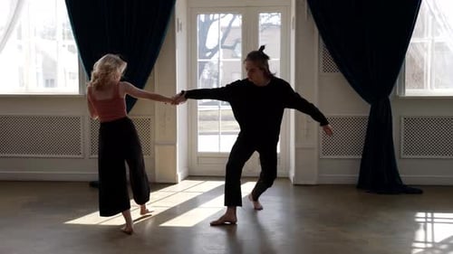 Two Women Dancing in Studio