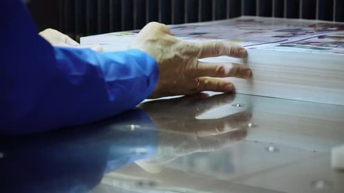 Man Works at Printing House