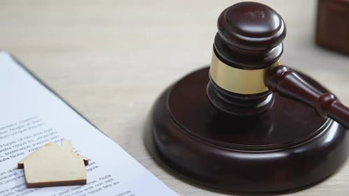 Wooden House on Table, Judge Hitting Gavel, Real Estate Affair, Court Verdict