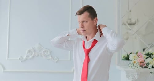 Groom Straightens His Tie Man Tying His Tie Groom Tying His Tie Wedding Groom Accessories