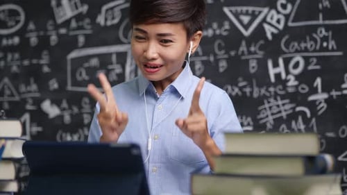Enthusiastic Woman Teaching Online Math Lesson