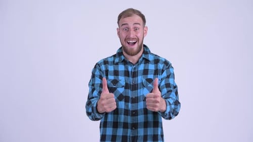 Bearded Man Gives Enthusiastic Thumbs Up