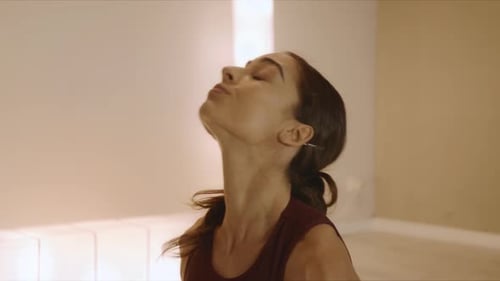 Woman Standing in Upward Facing Dog Pose. Girl Doing Exercises at Yoga Studio
