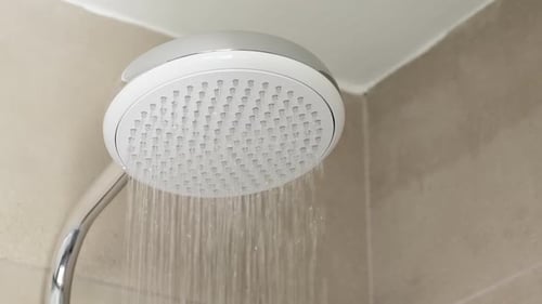 Water Flowing From Modern Shower Head
