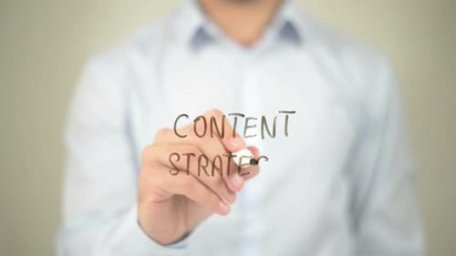 Writing Content Strategy on Clear Surface