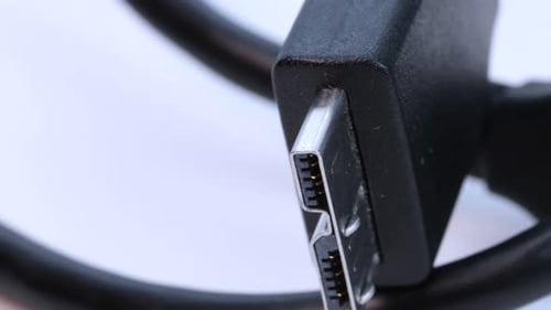 ssd hard disk wire plug connector, macro shot close up view in 4k over white background.
