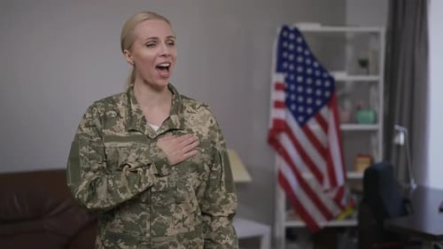 Blonde Woman in Military Uniform Pledging Allegiance