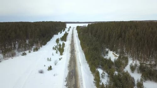 Car On The Winter Snowy Road