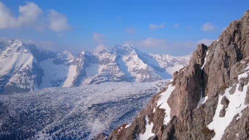 Horizontal Panorama of Wide Mountain Range in Winter. Hills Covered With Snow