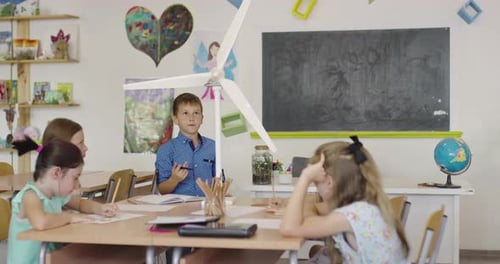 Elementary School Stem Robotics Classroom Diverse Group of Children Building and Programming