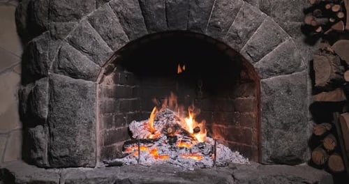 Burning Fire In The Fireplace