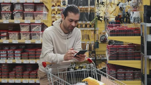 Portrait of Man Shopping at Hardware Store