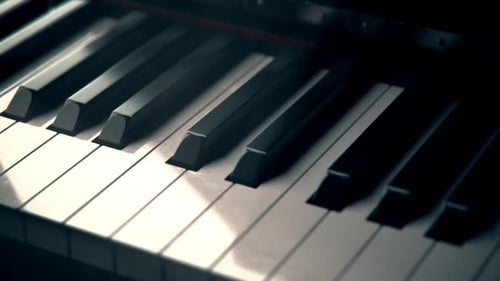 Black and white piano keys in close up. Beautiful glossy, antique instrument. 4K