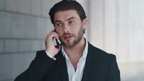 Businessman Having Phone Conversation at Street. Manager Talking on Smartphone