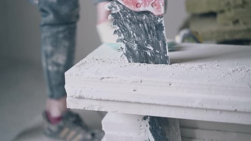 Cutting Stacked Plasterboard with Saw