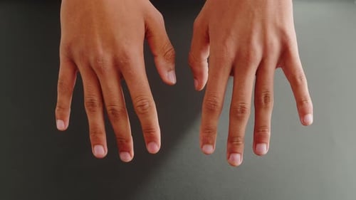 Overhead View of Two Open Hands